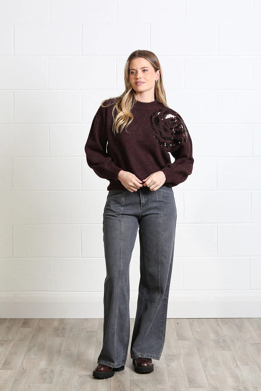 Rant & Rave Sarah Jumper in burgundy worn by model, front view with sequin rose detail on shoulder