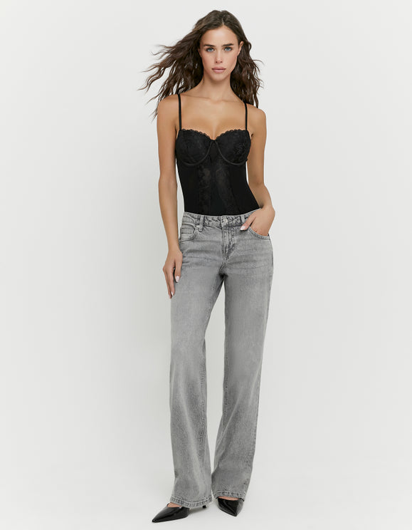 Tally Weijl grey low waist straight leg jeans worn by model, front view