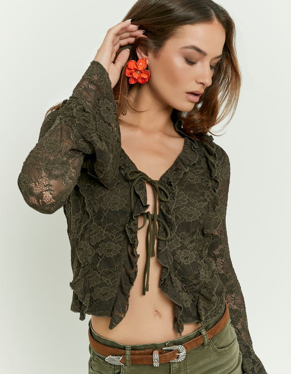 Tally Weijl khaki lace top in green, angled model view with tie - front opening and ruffle trim