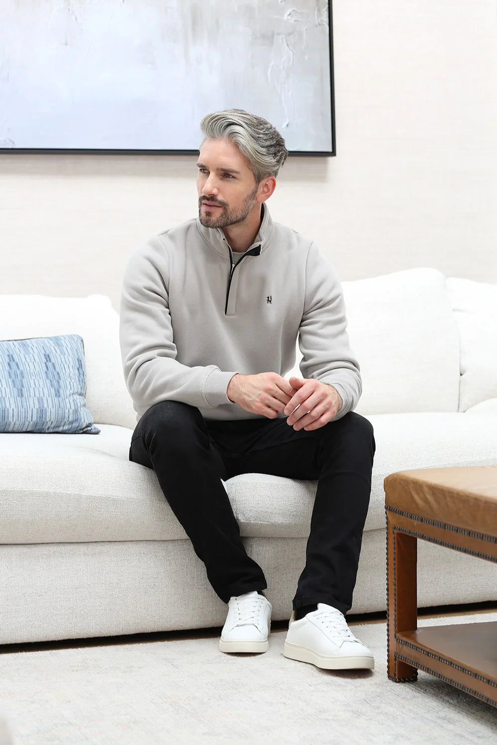 Kenrow Wesley Half Zip Putty worn by model seated on sofa