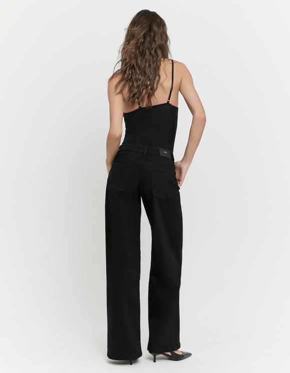 Tally Weijl black high waist wide leg jeans worn by model, back view