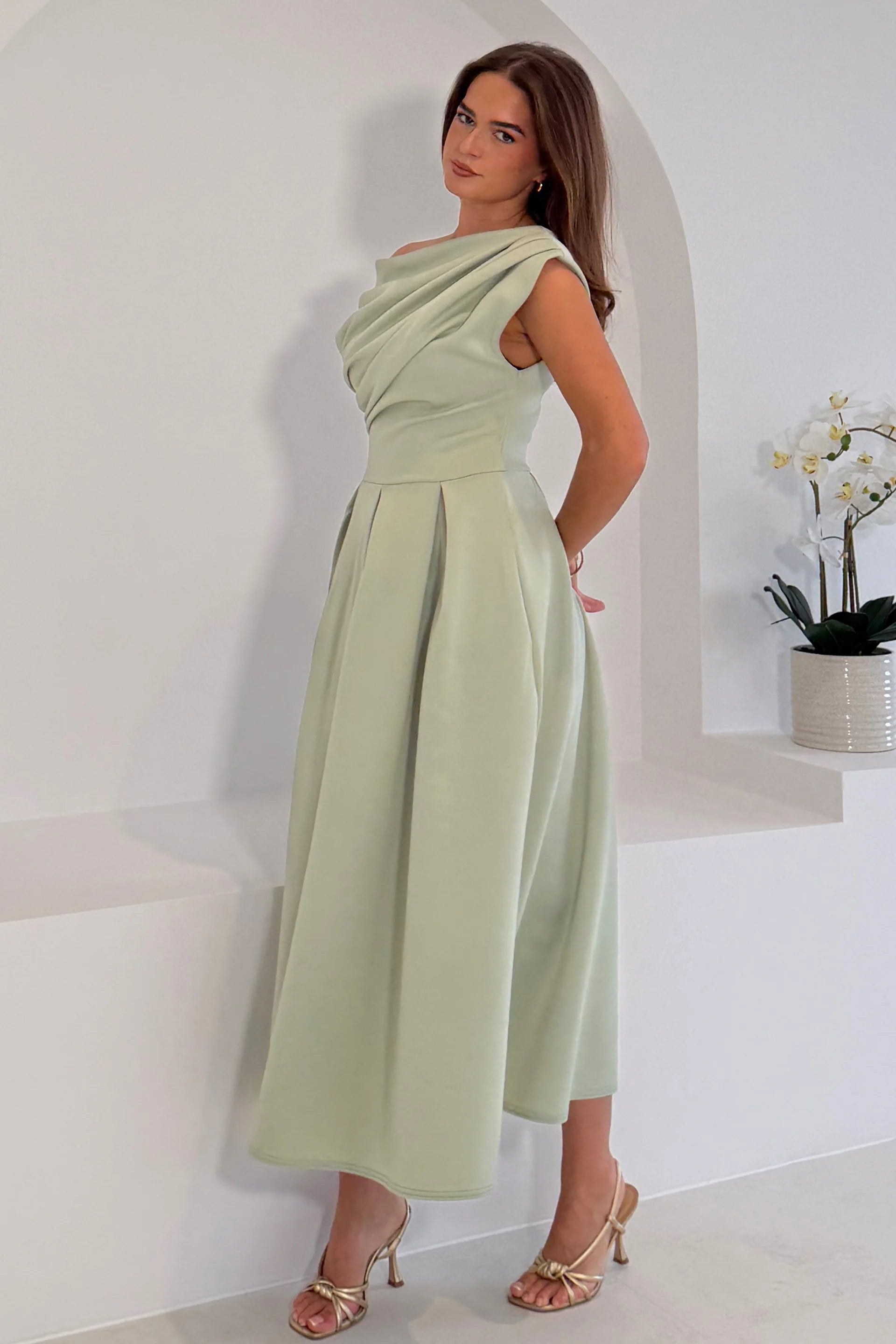 Girl In Mind Betty asymmetric neckline skater midi dress in sage, angled front model view