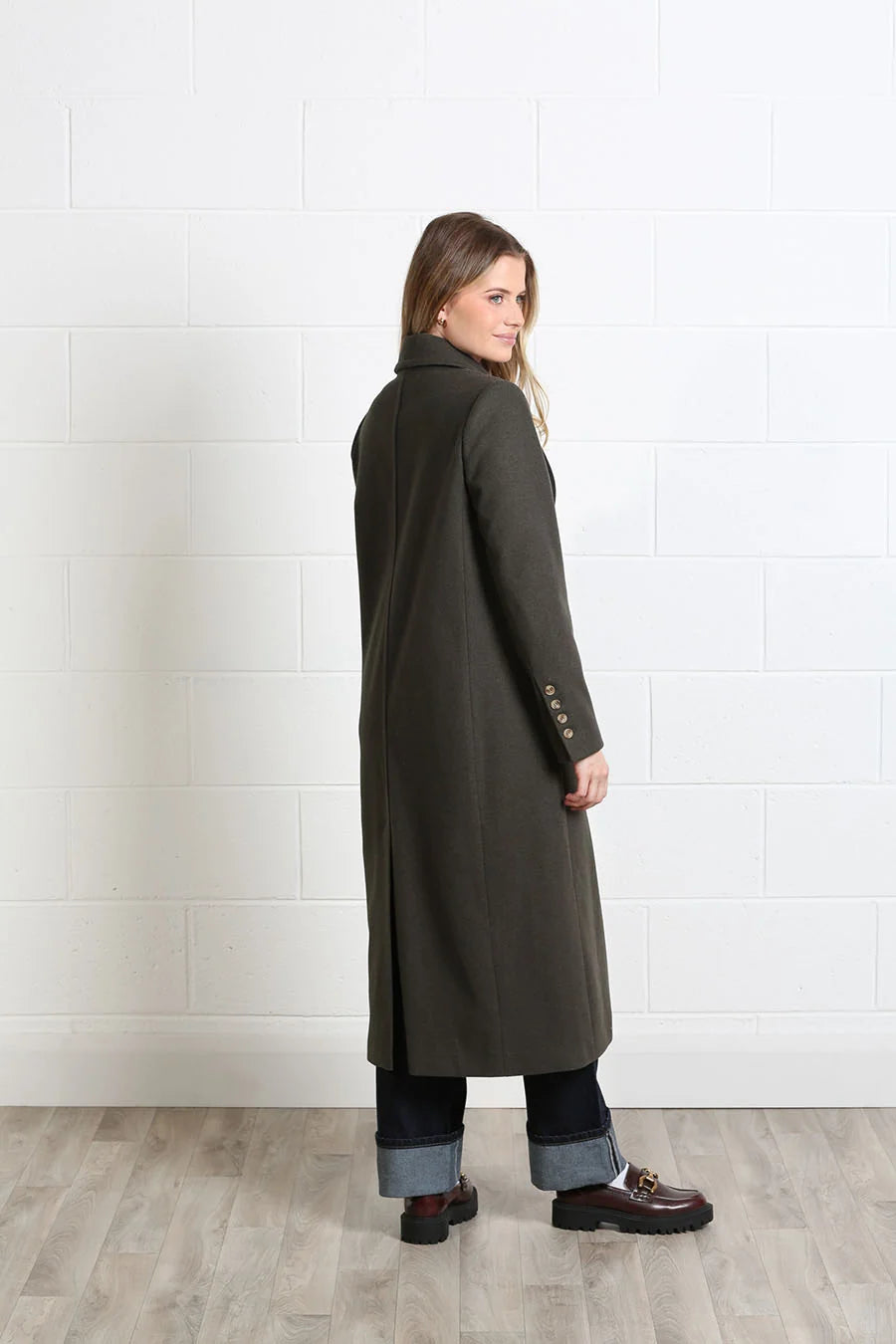 Rant & Rave Olivia Coat deep moss back view worn by model with rear seam and longline hem