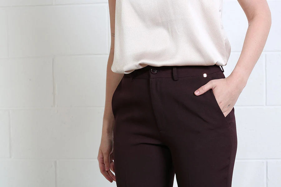 Rant & Rave Valerie Slim Trouser in aubergine, detail view of front waistband, button and pocket