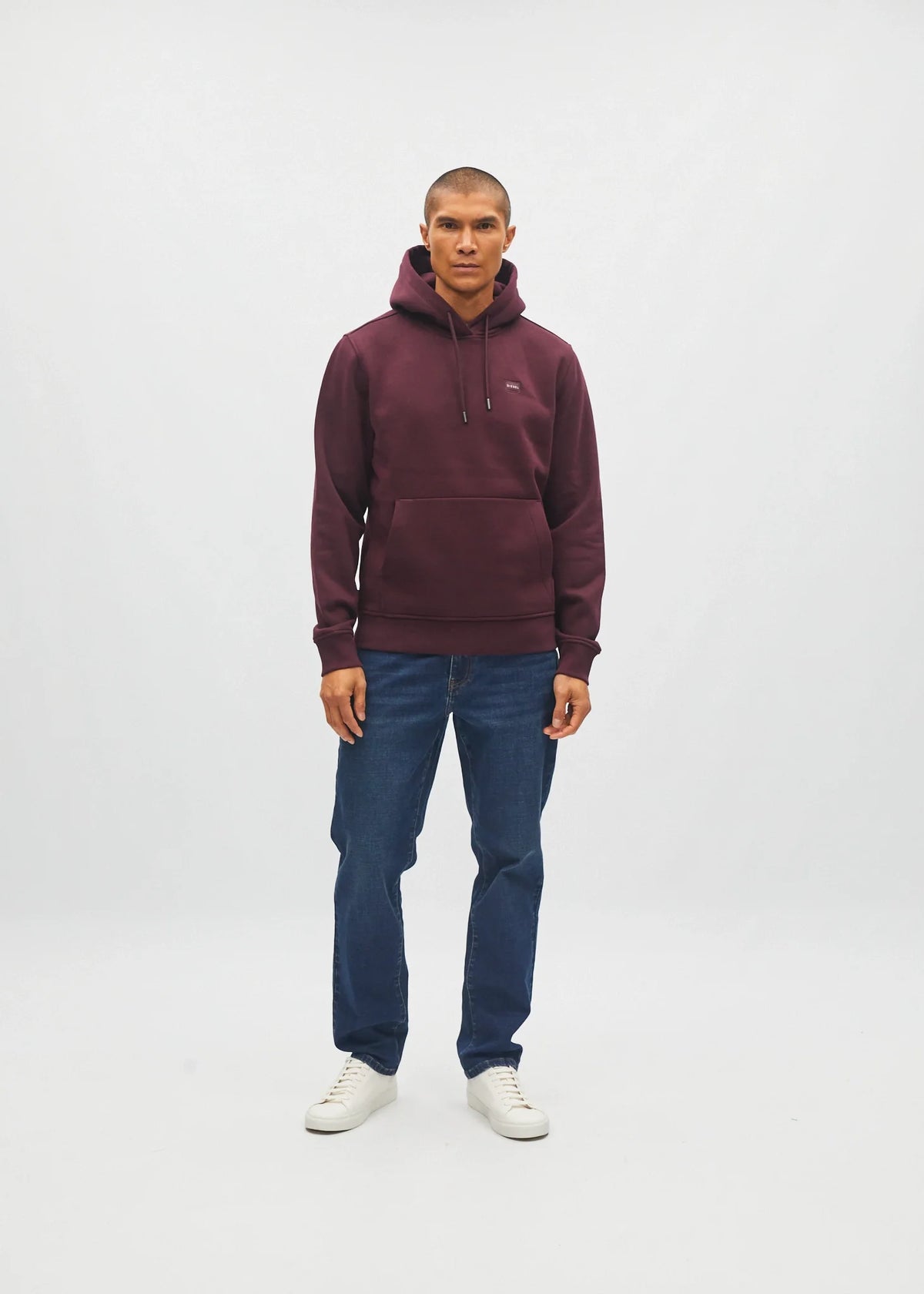 Diesel Julian hoodie in deep burgundy, front view worn by model with hands at sides