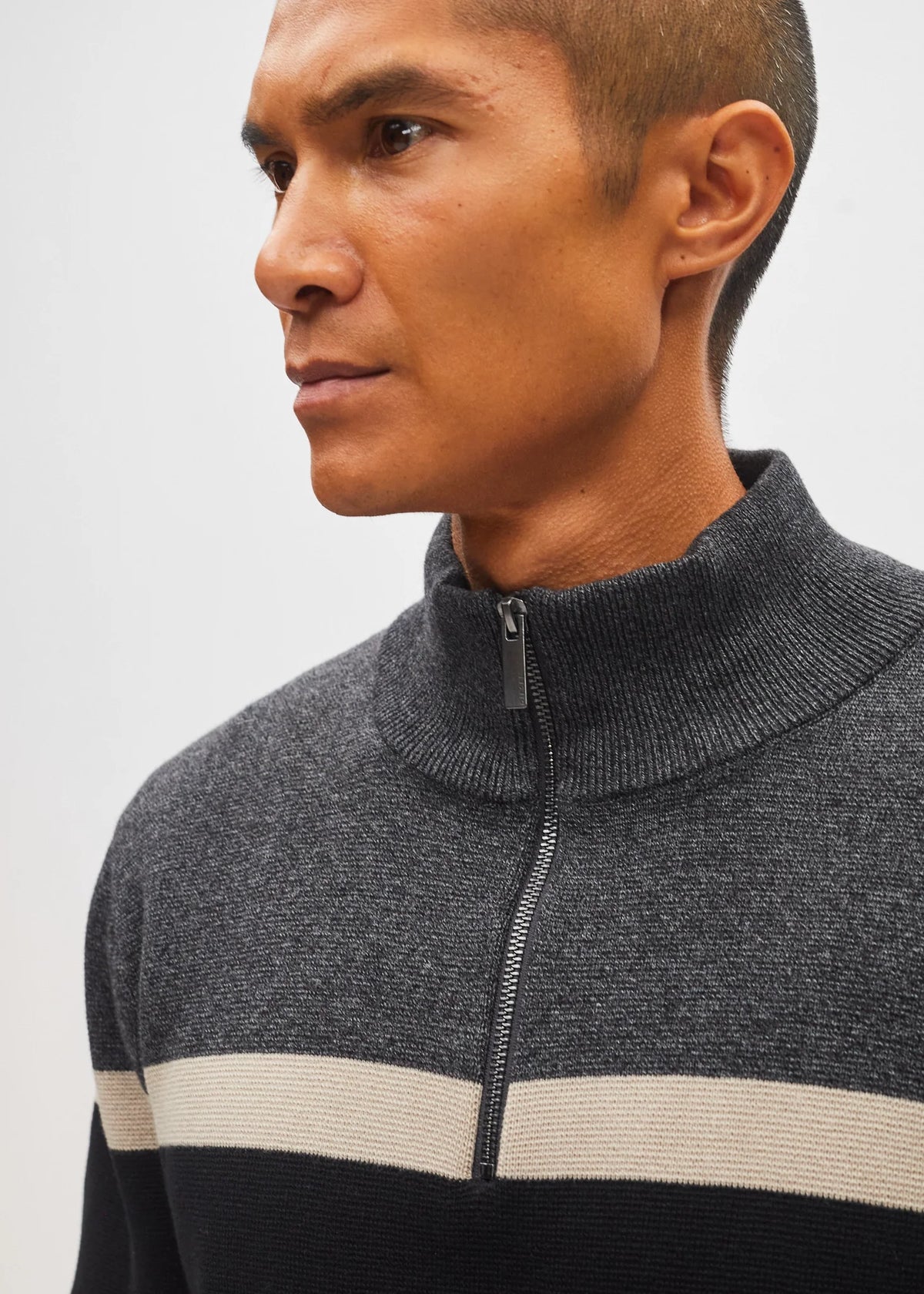 Close - up detail of the Diesel Tully Half Zip sweater collar and zip fastening