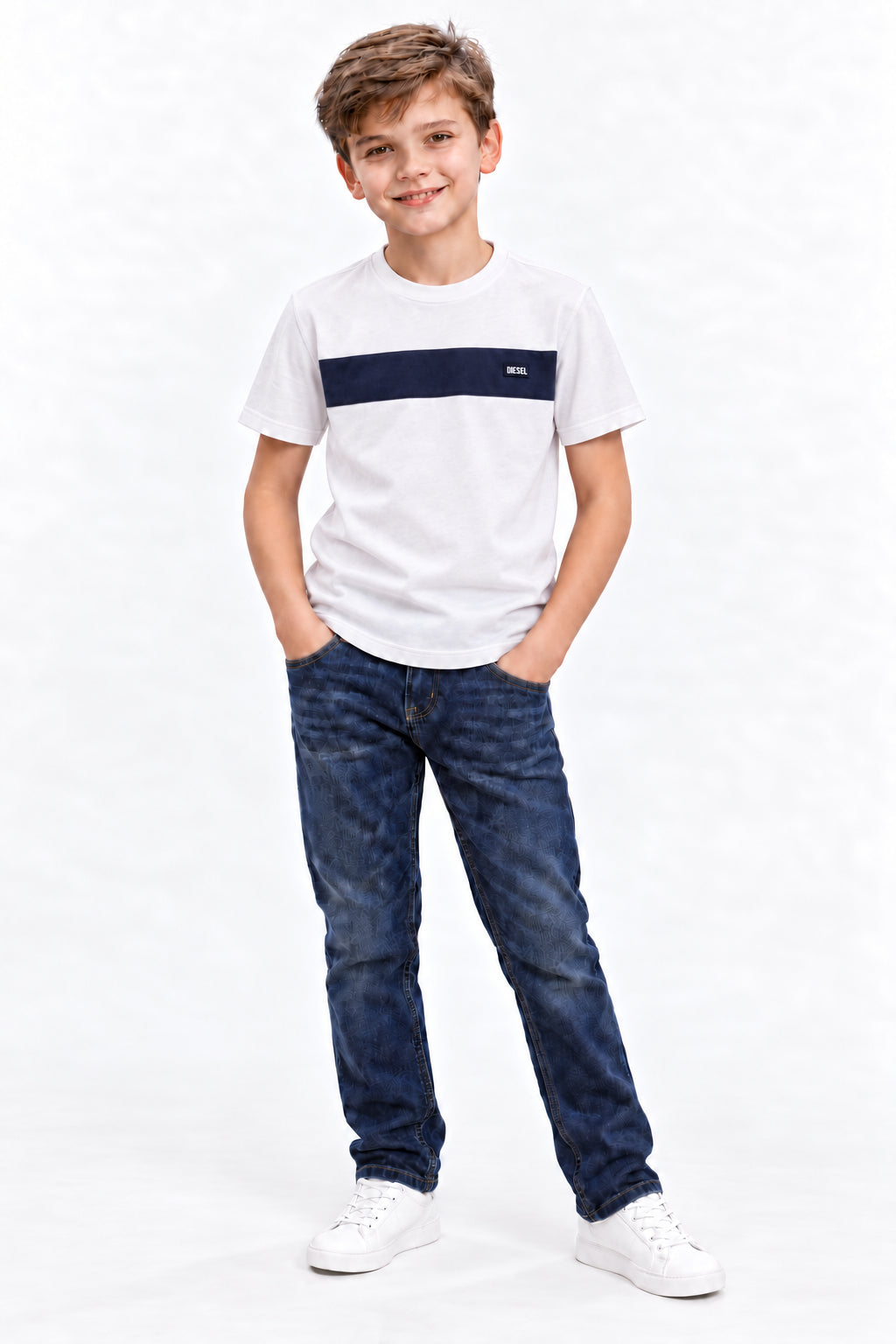 Boy wearing the Diesel Myles white T-shirt with navy chest panel, front view.