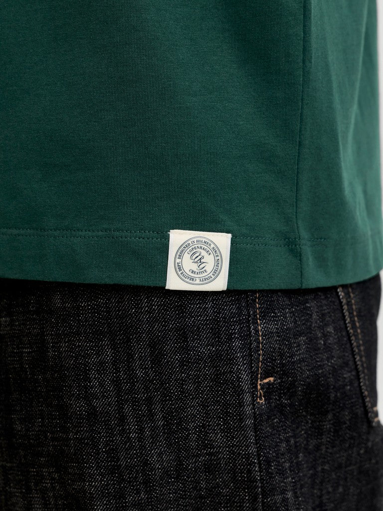 JACK & JONES Frederiksberg Monogram Crew Neck Tee in Pine Grove hem logo tab detail
