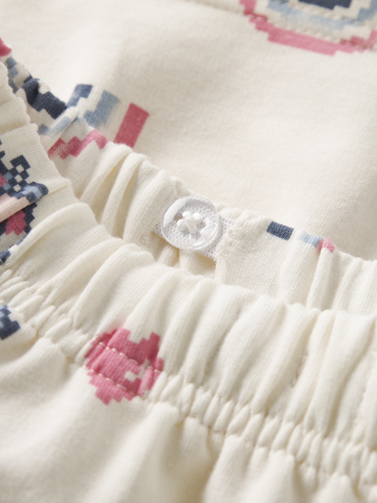 NAME IT Lilith Sweat Skirt in Antique White button waist detail