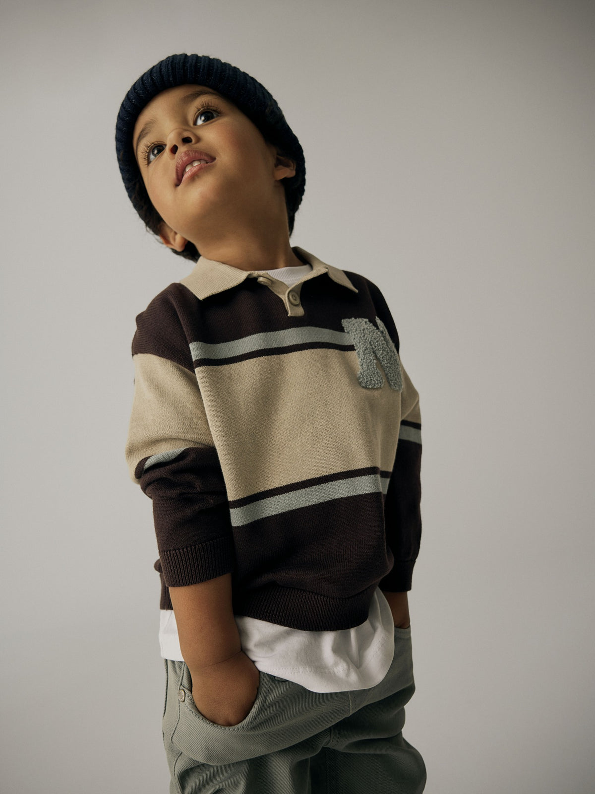 NAME IT Ral Boys' Knitted Polo Neck in Chocolate Plum Without N angled view on model