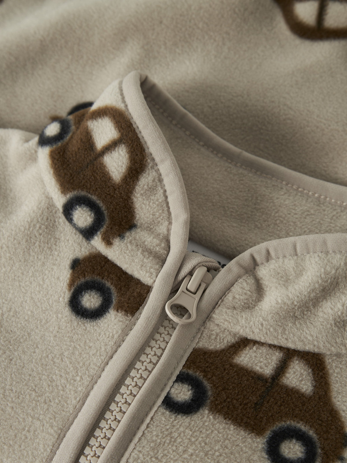 NAME IT Orlajs Fleece Jacket in Island Fossil car pattern and zip detail