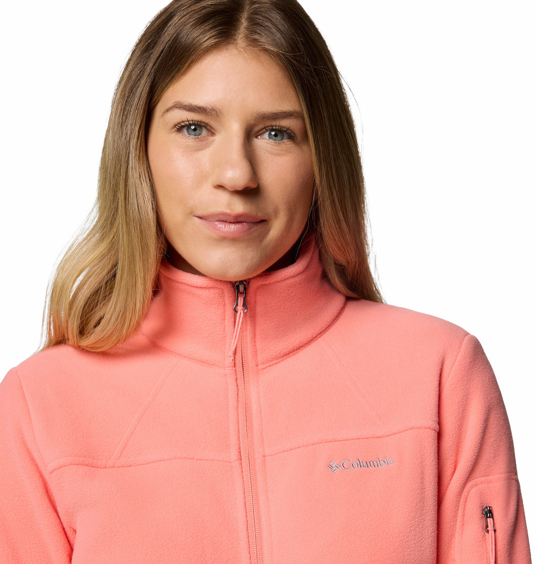 Woman wearing a pink fleece jacket with a brand logo on a white background