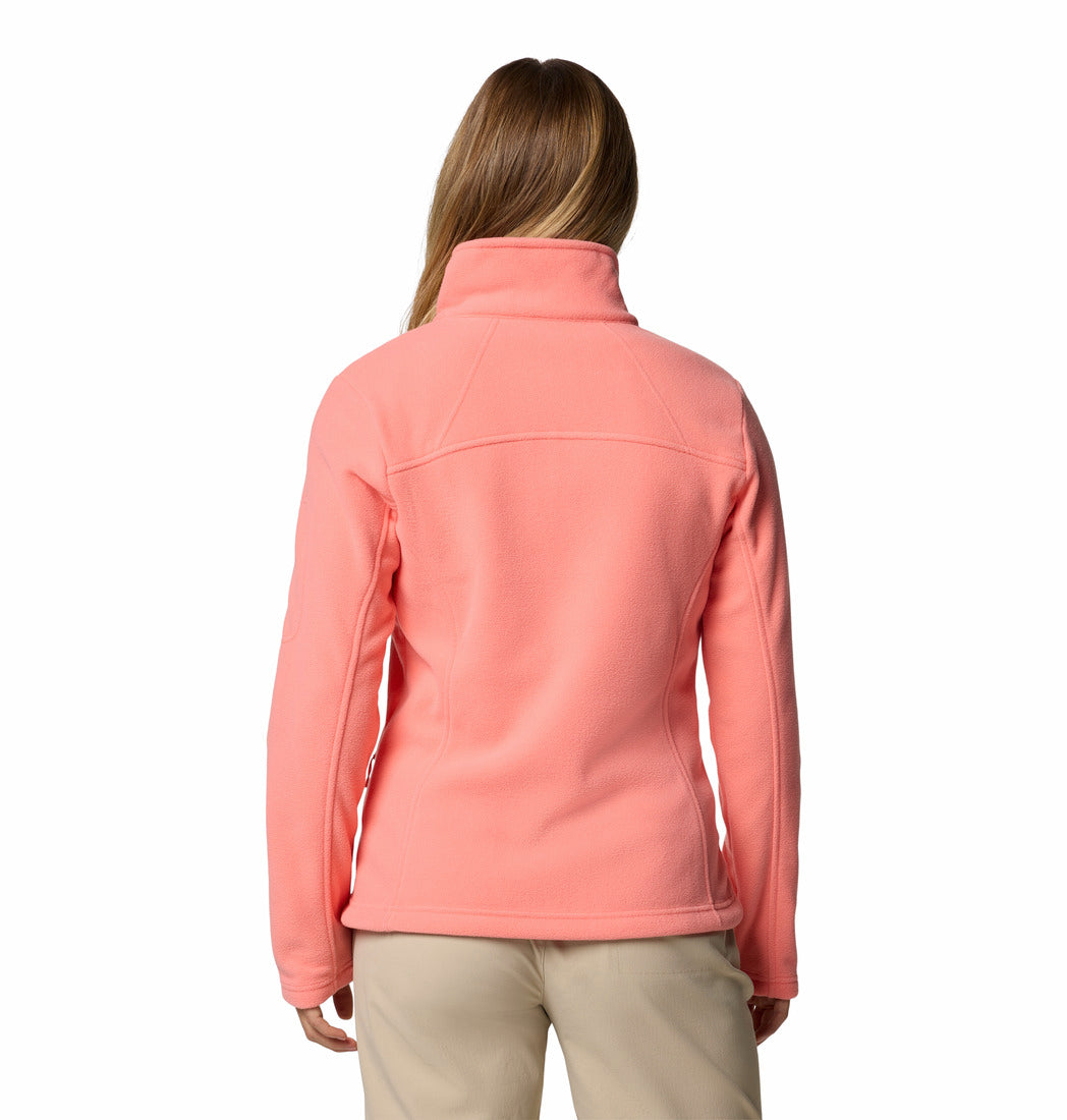 Person wearing a pink jacket on a white background