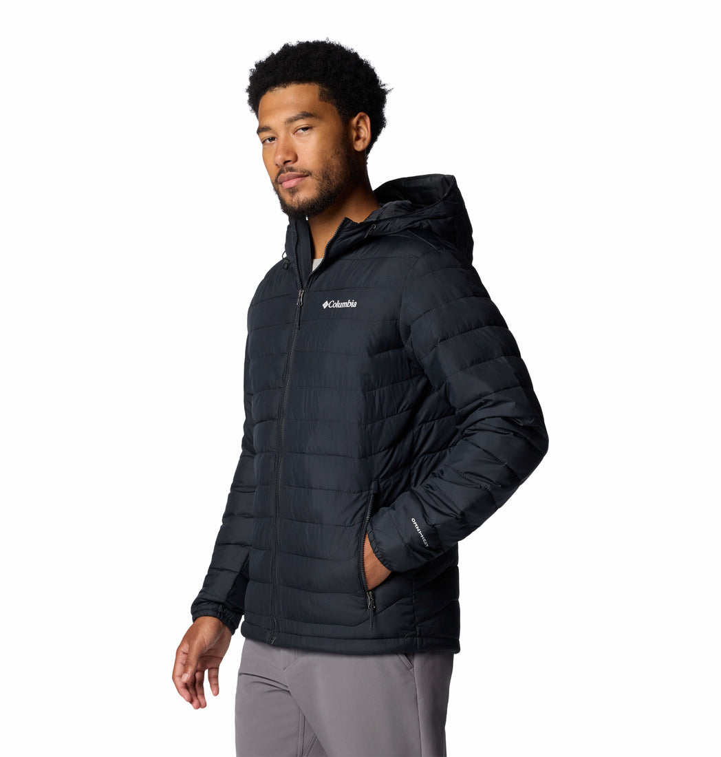 Man wearing a black Columbia jacket on a white background