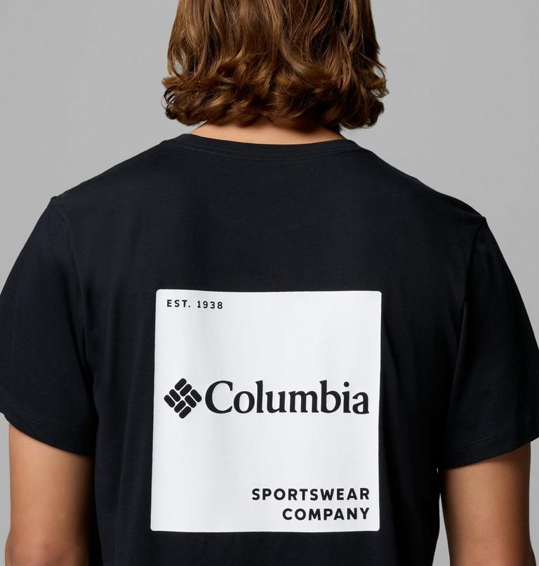 Person wearing a black Columbia Sportswear Company t-shirt with a white logo on the back.