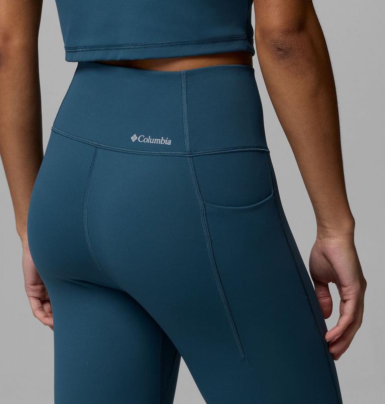 Teal leggings with Columbia logo on a gray background
