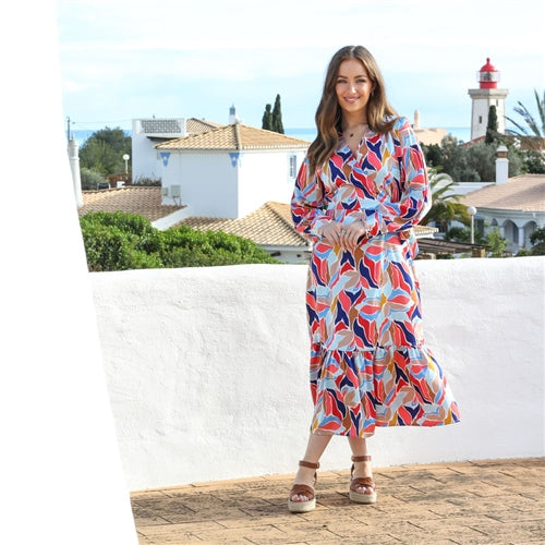 Front model view of the Cassandra blue and coral midi dress