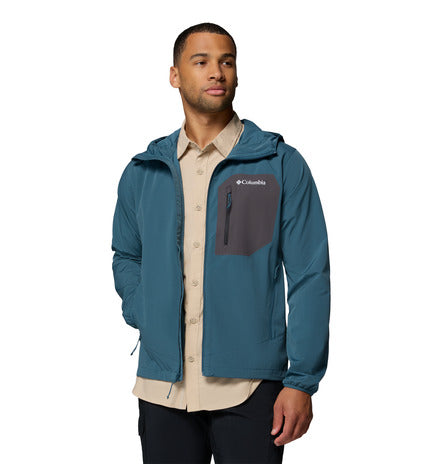 Man wearing a blue jacket with Columbia logo on a white background