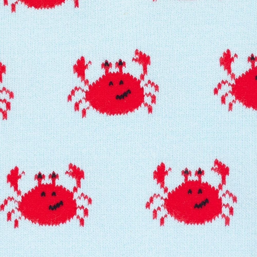 Pattern of red crabs on a light blue background