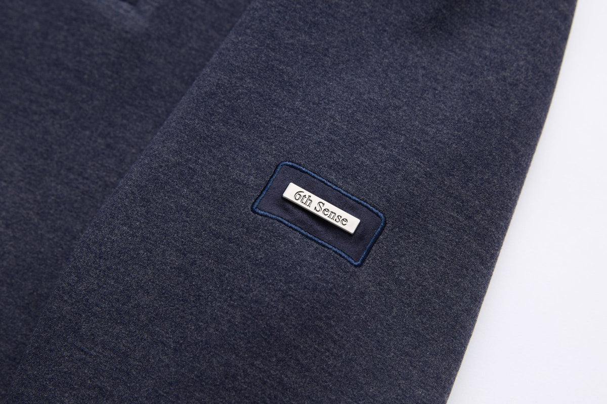 6th Sense woven label on the navy Air 1/4 Zip Sweat sleeve