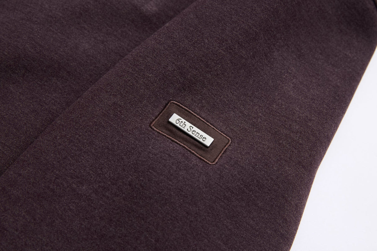 6th Sense Air Plum 1/4 Zip Sweat fabric with woven 6th Sense label on the sleeve