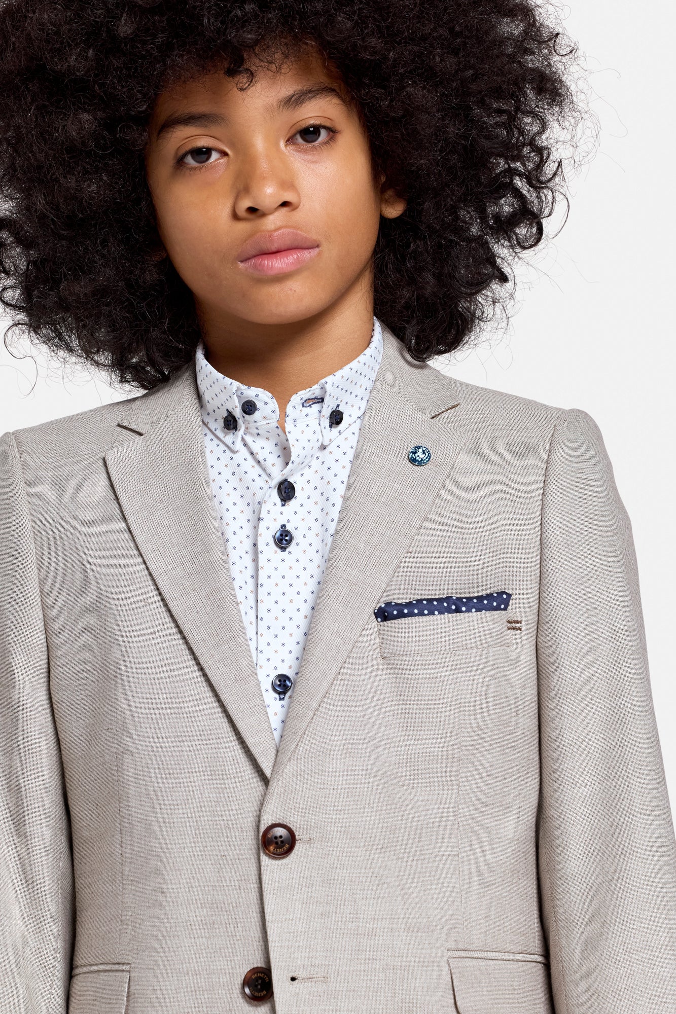 Detail view of the Harry boys beige blazer fabric and finish
