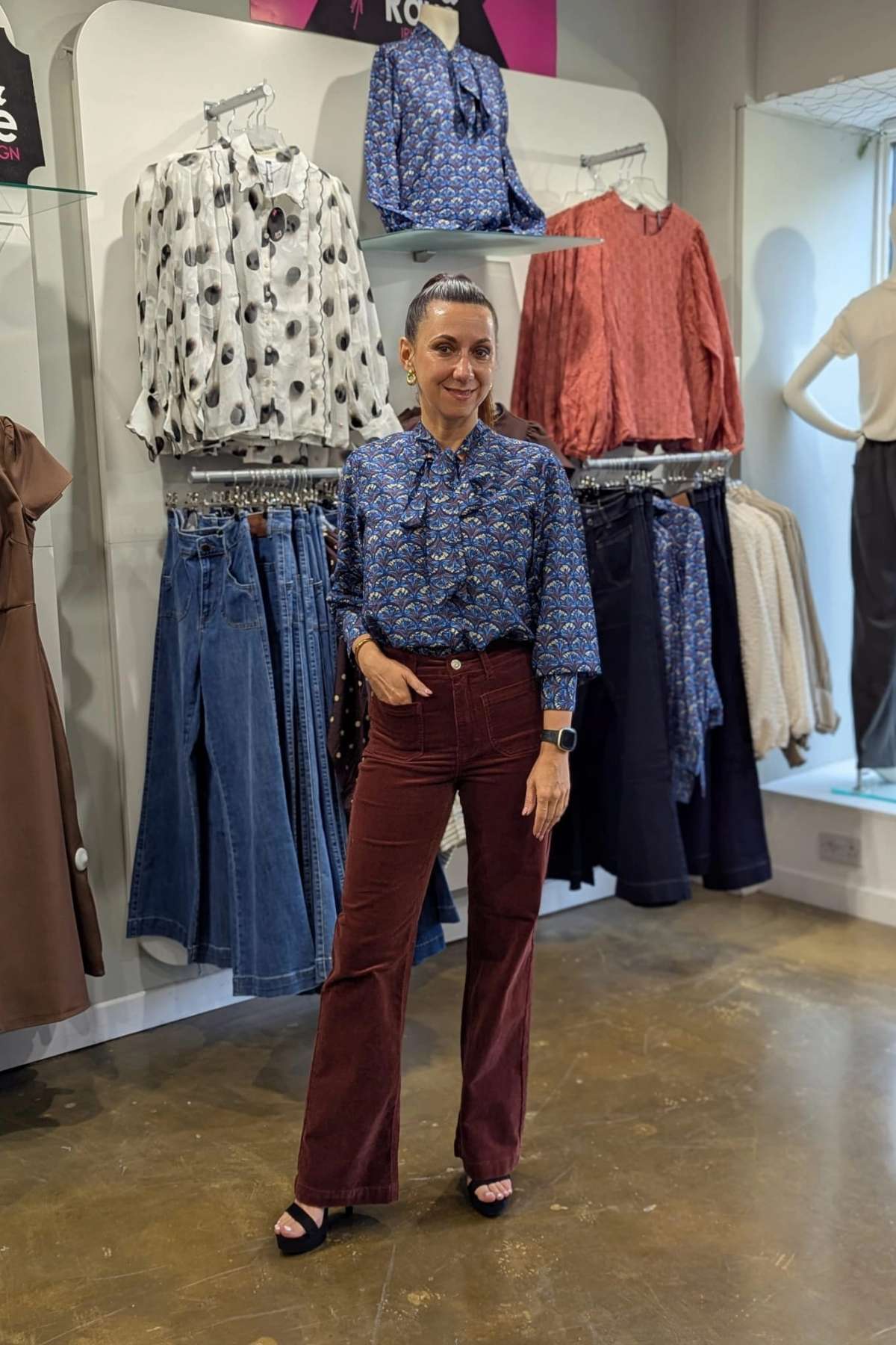 Olivia in the Bridget Wide Leg Terracotta Cords