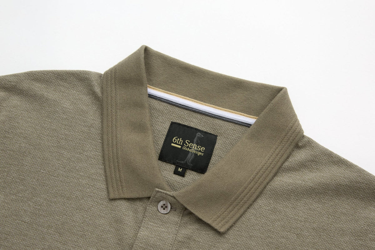 6th Sense Evoke Brindle Polo collar and inner neck label with stripe tape and size M tag.