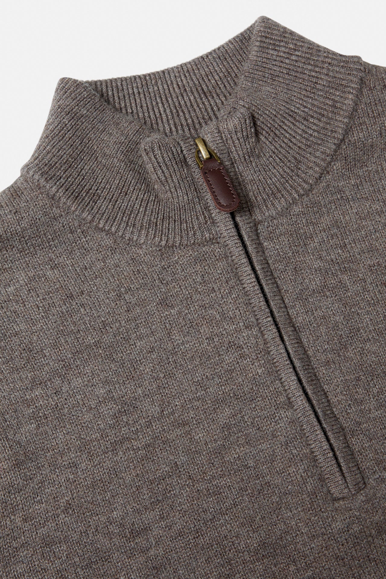 Close-up of the Benetti Franco Brown 1/4 Zip knit, showing the ribbed collar and quarter-zip closure with leather pull tab.