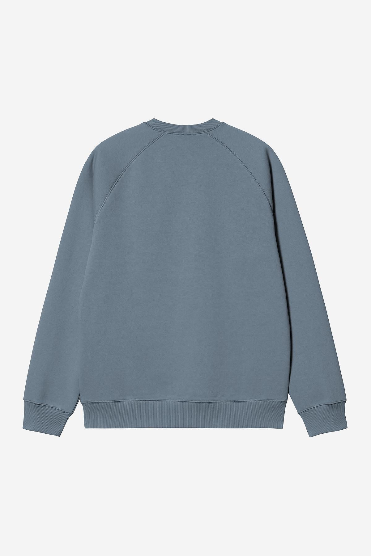 Blue sweatshirt on a light gray background