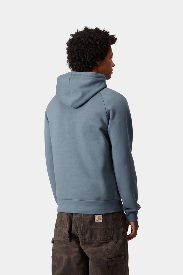 Person wearing a blue hoodie from behind on a white background