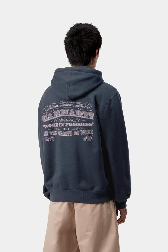 Person wearing a navy hoodie with text on the back against a white background