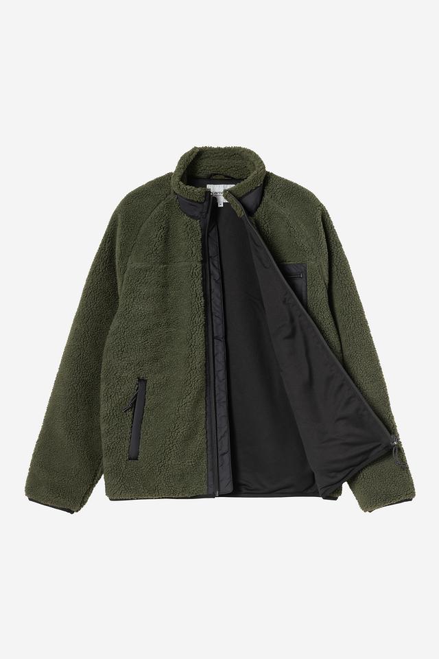 Green fleece jacket with black lining on a white background