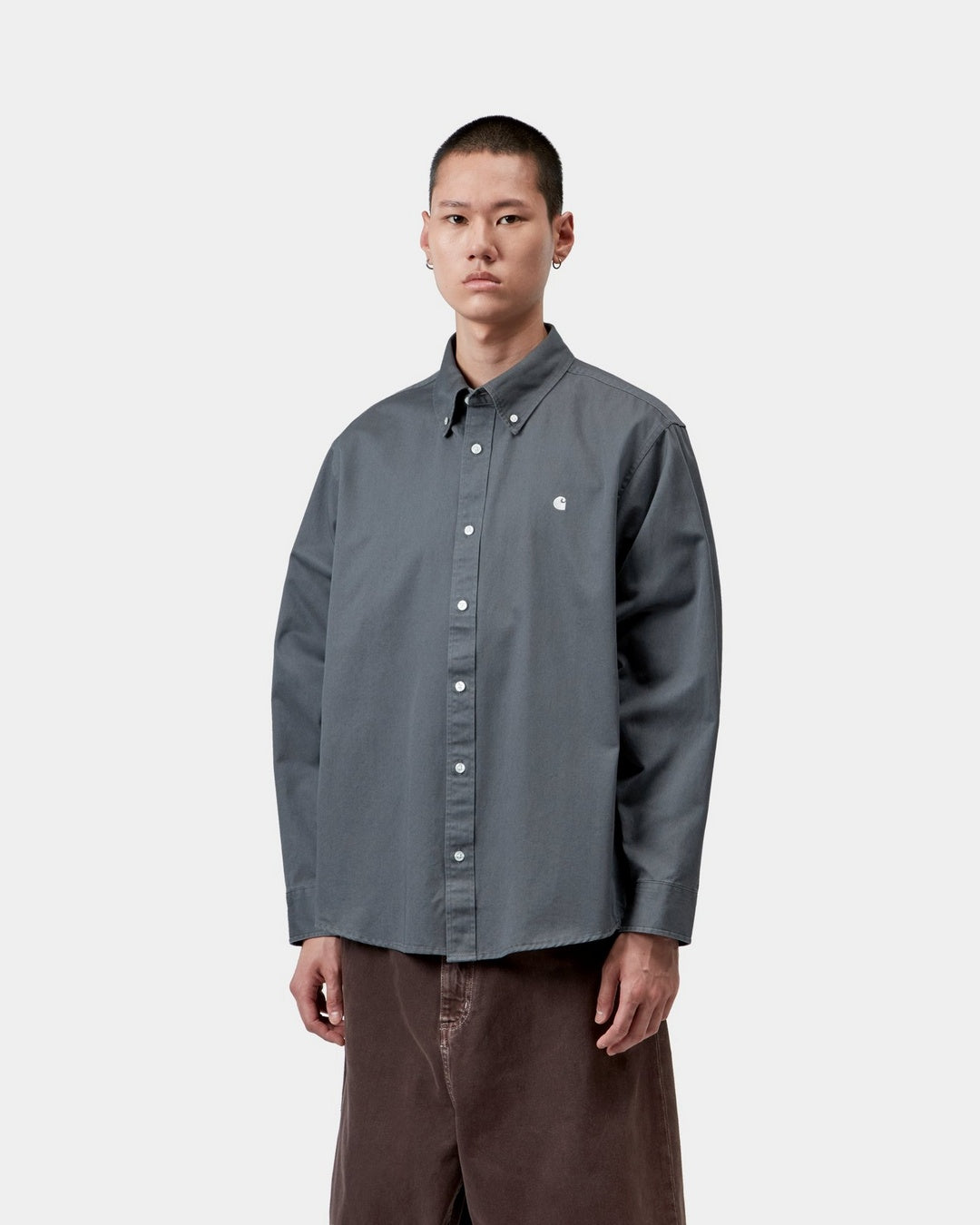 Carhartt WIP L/S OG Madison Shirt in Styx, shown front view with button-down collar and chest logo embroidery, shown on model.