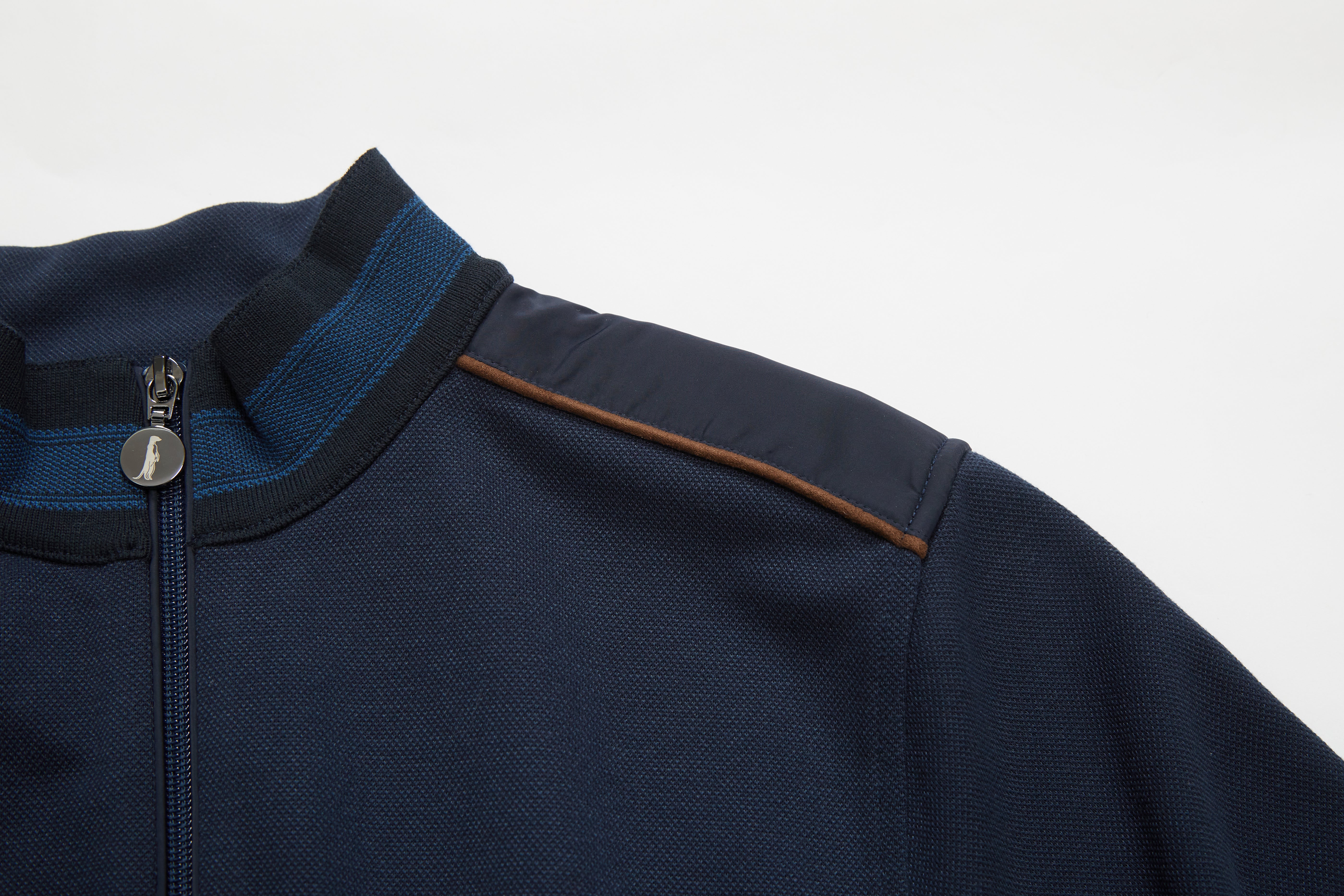 Navy blue jacket with a zipper and brown stripe on a white background