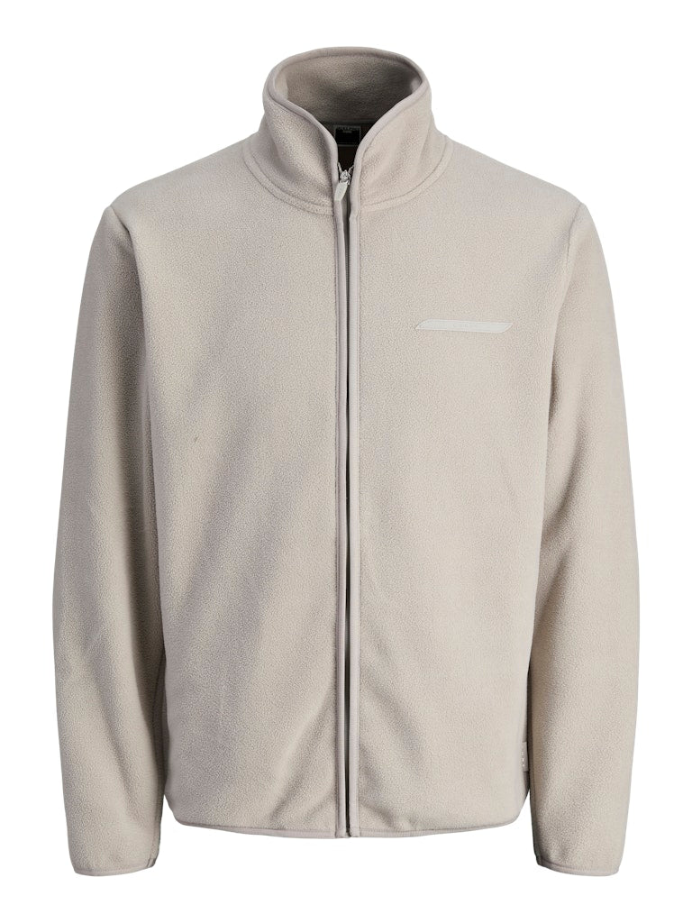 Beige fleece jacket on a white background