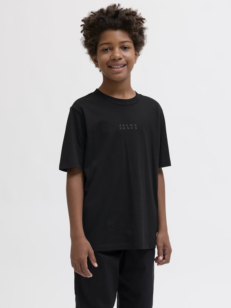 Child wearing a black t-shirt with a logo on a white background