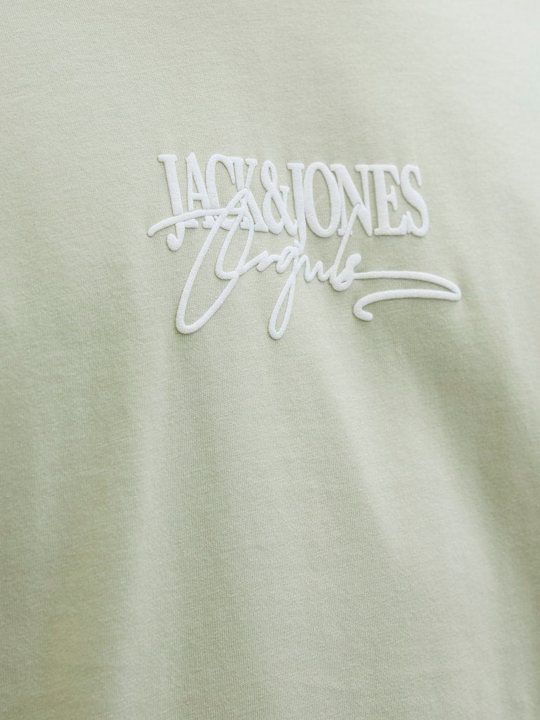 Almeria Branding Celadon Tint Tee-Logo close up view