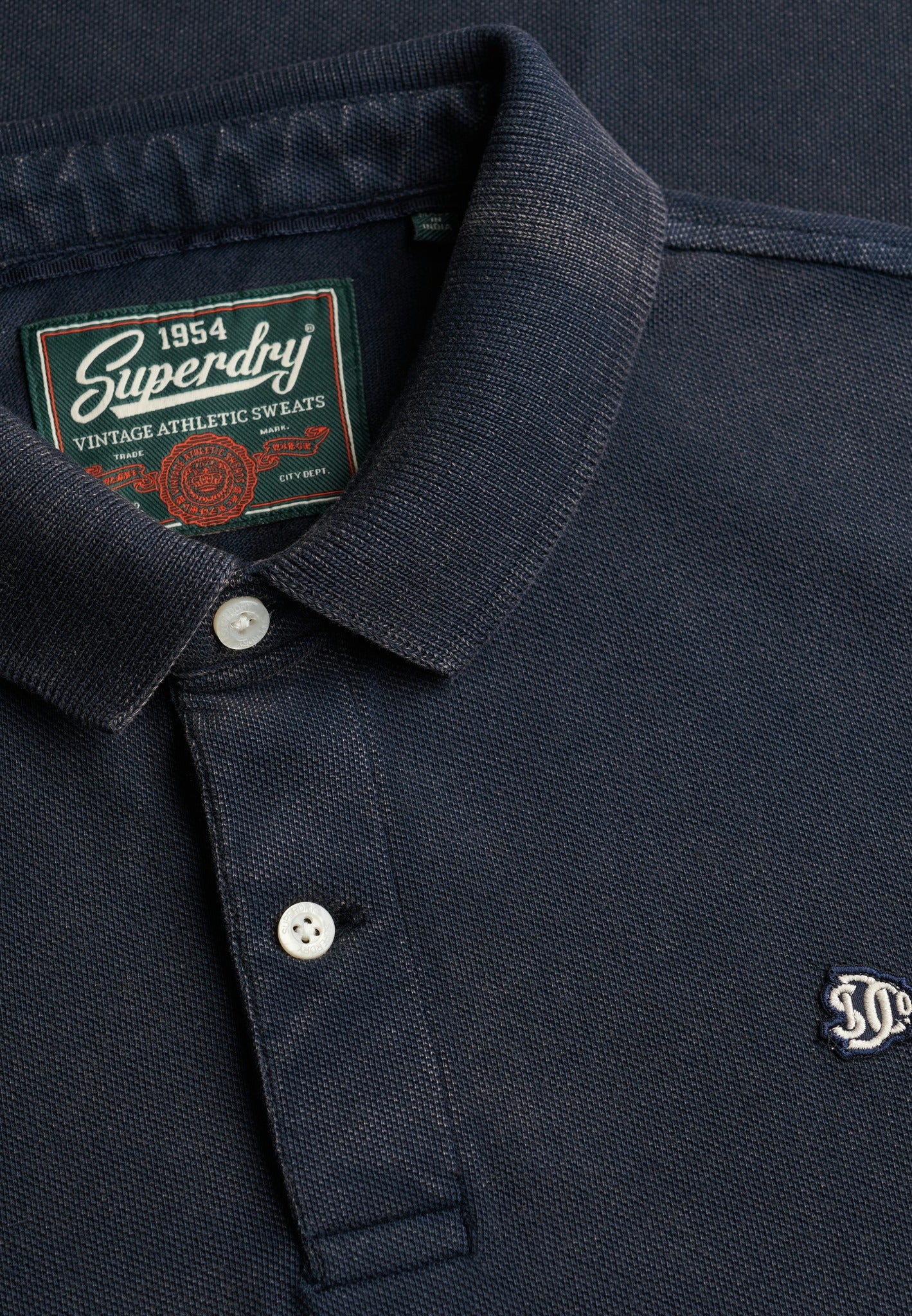 Superdry Vintage Destroy Polo in Eclipse Navy collar and placket detail