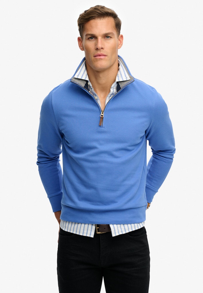 SUPERDRY Essential Pique Half Zip-Chambray Blue Chambray Blue model front view