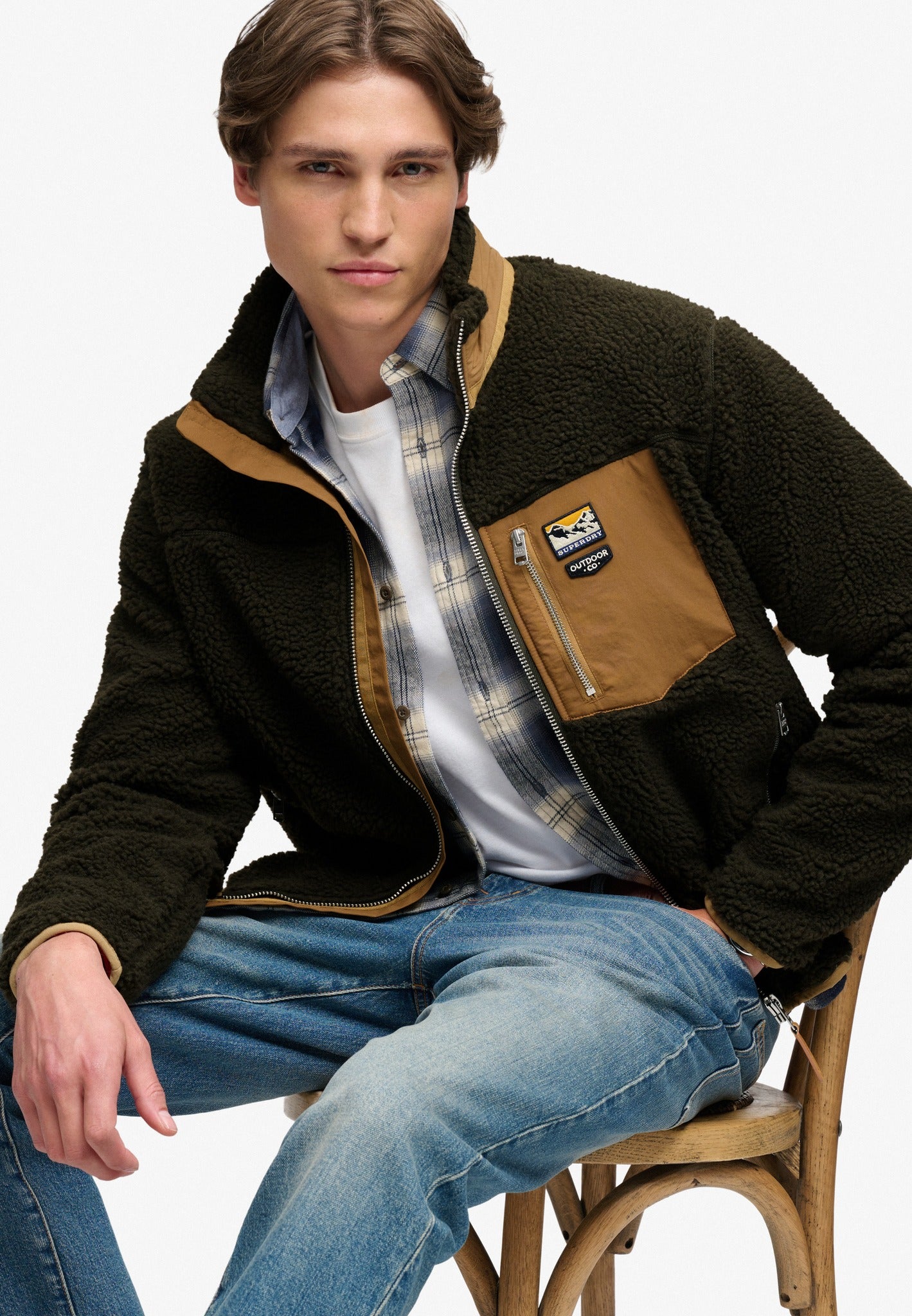 Superdry Mountain Full Zip Fleece in Surplus Goods Olive/Deep Brown seated model view