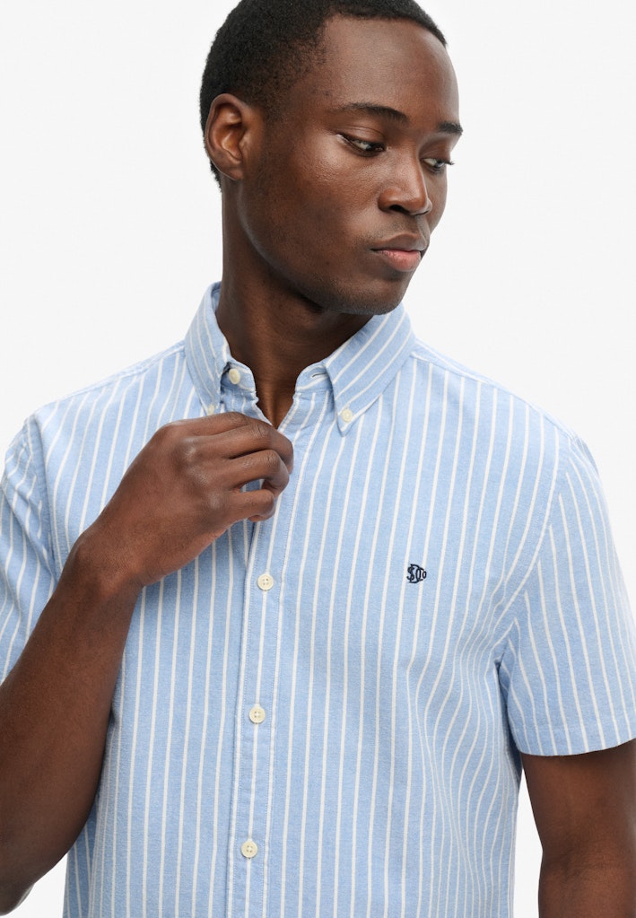 Superdry Preppy Oxford Short Sleeve Shirt in Broker Blue Stripe angled model view