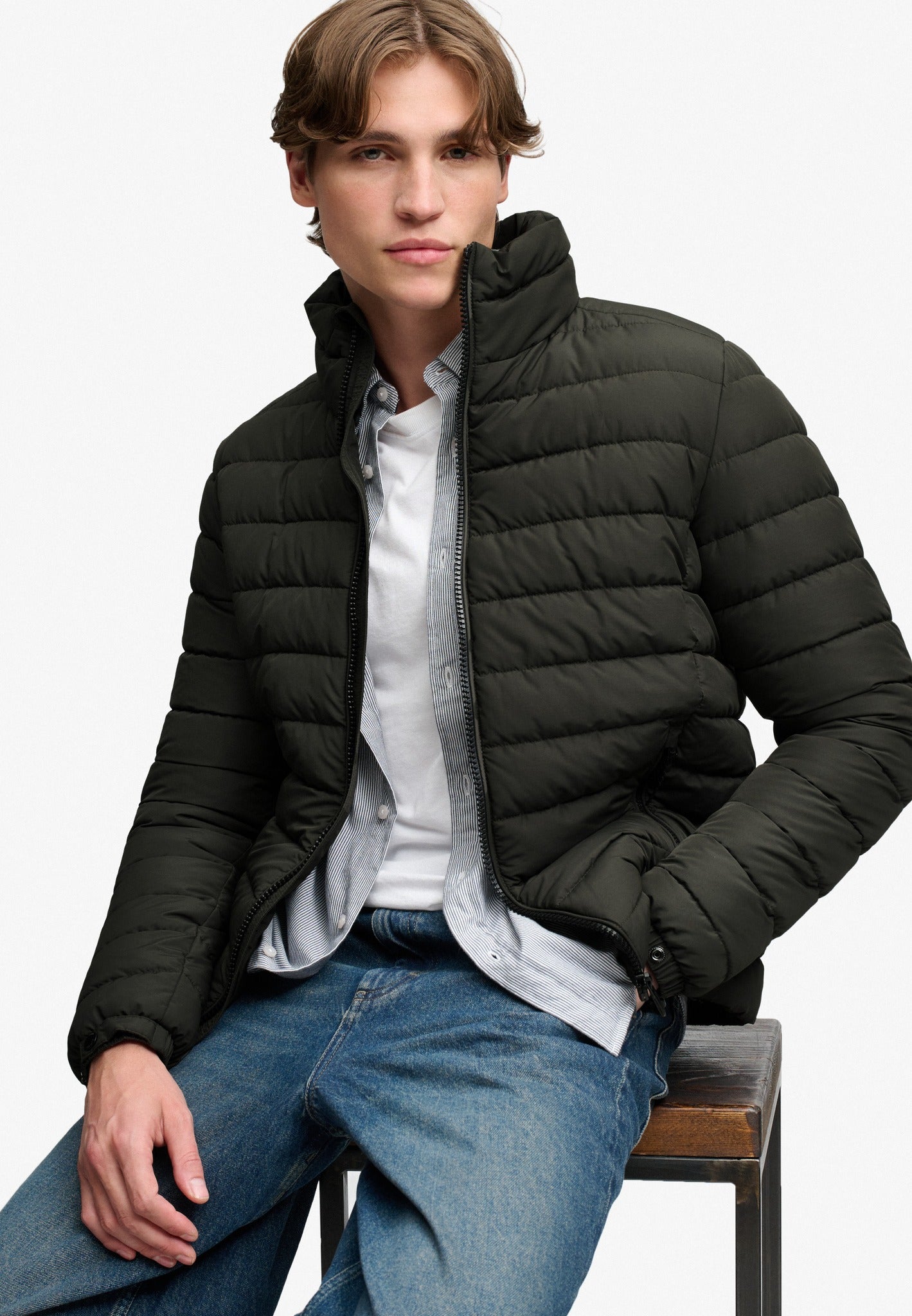 Superdry Fuji Midweight Padded Jacket in Surplus Goods Olive Green seated model view