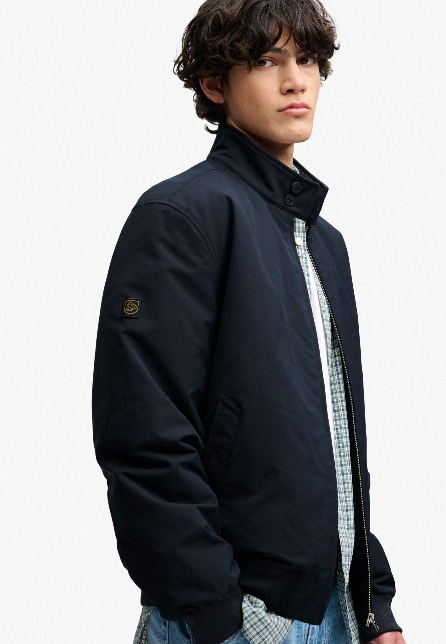 Superdry Campus Padded Harrington Jacket in Eclipse Navy angled model view