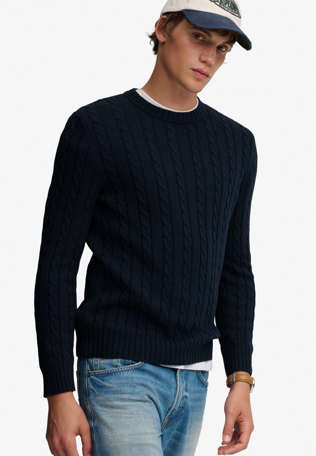 Superdry Cotton Cable Knit Crew in Eclipse Navy angled view on model