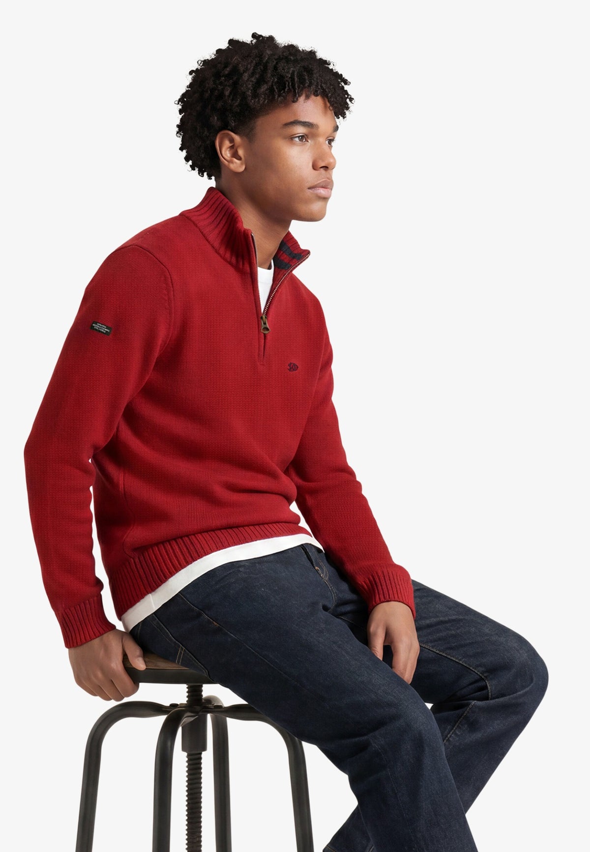 Superdry Cotton Half Zip Knit in Expedition Red seated view