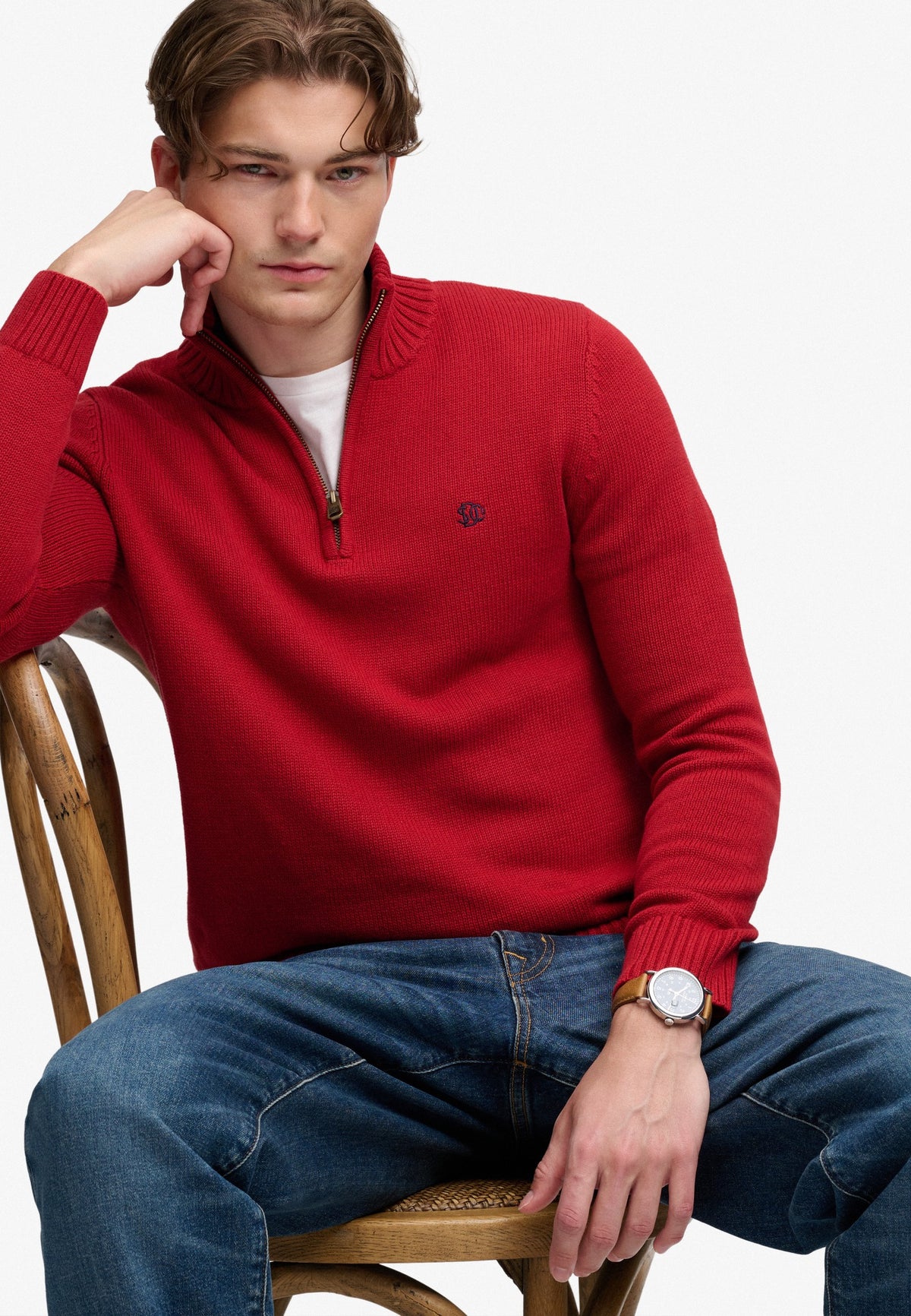 Superdry Cotton Half Zip Knit in Expedition Red seated view angled view