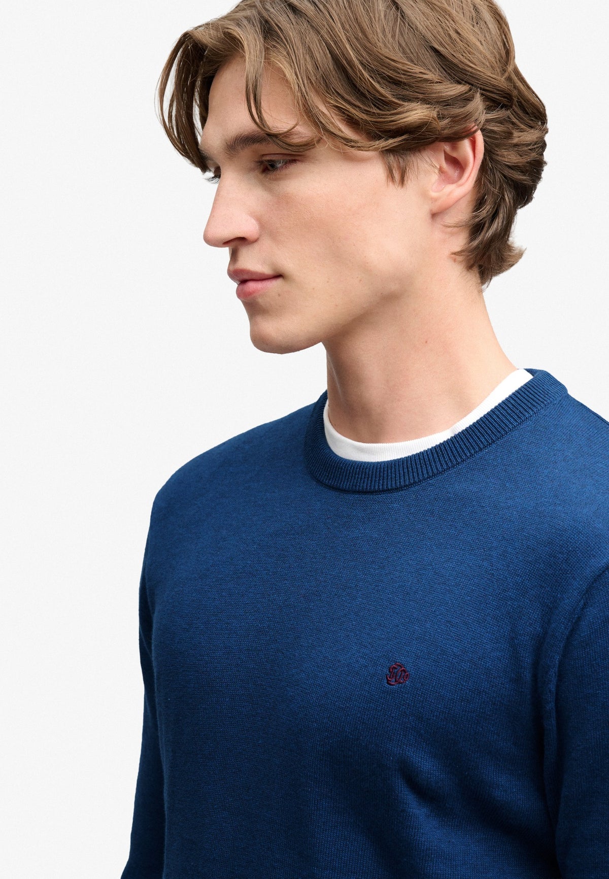 Superdry Prep Essential Cotton Jumper in Pilot Blue Marl angled view on model
