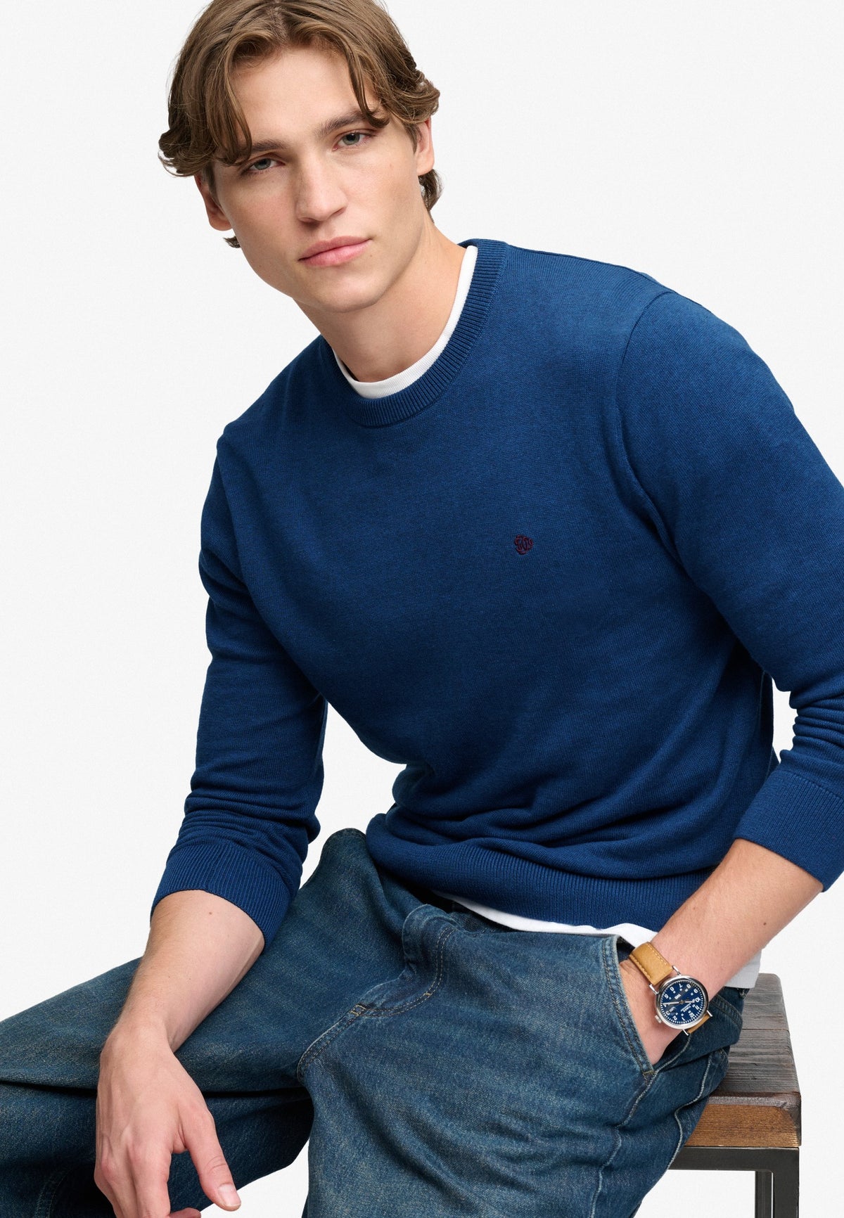Superdry Prep Essential Cotton Jumper in Pilot Blue Marl seated view