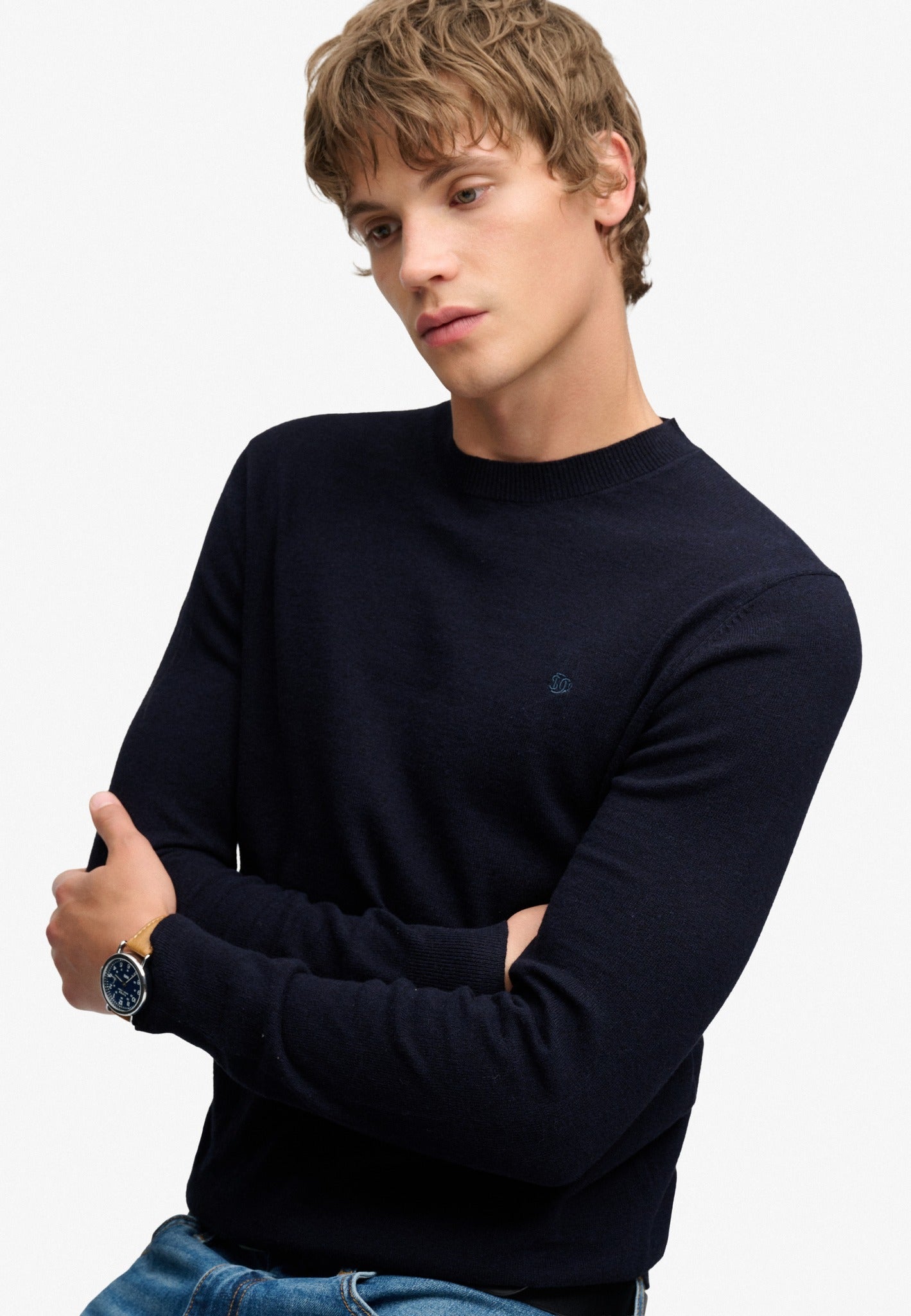 Superdry Essential Lightweight Wool Blend Jumper in Deepest Navy angled view on model
